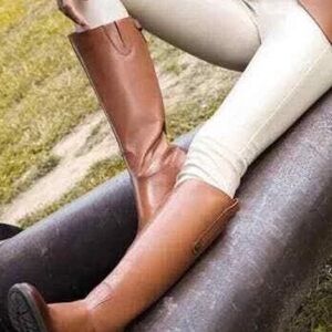 “Sam Edelman” Penny riding boot in whiskey leather.